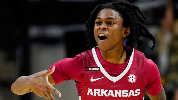 Razorbacks guard Keyon Menifield against Missouri